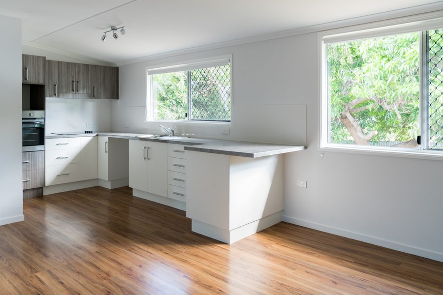 Luxury vinyl plank flooring after professional cleaning in a Louisville kitchen